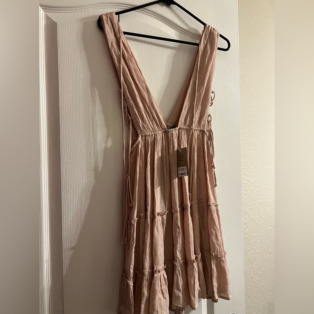 Summer dress with tags, never worn, size small original price of 49.00